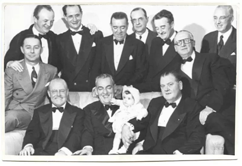 Group of men supporting Sheridan who was left at their building